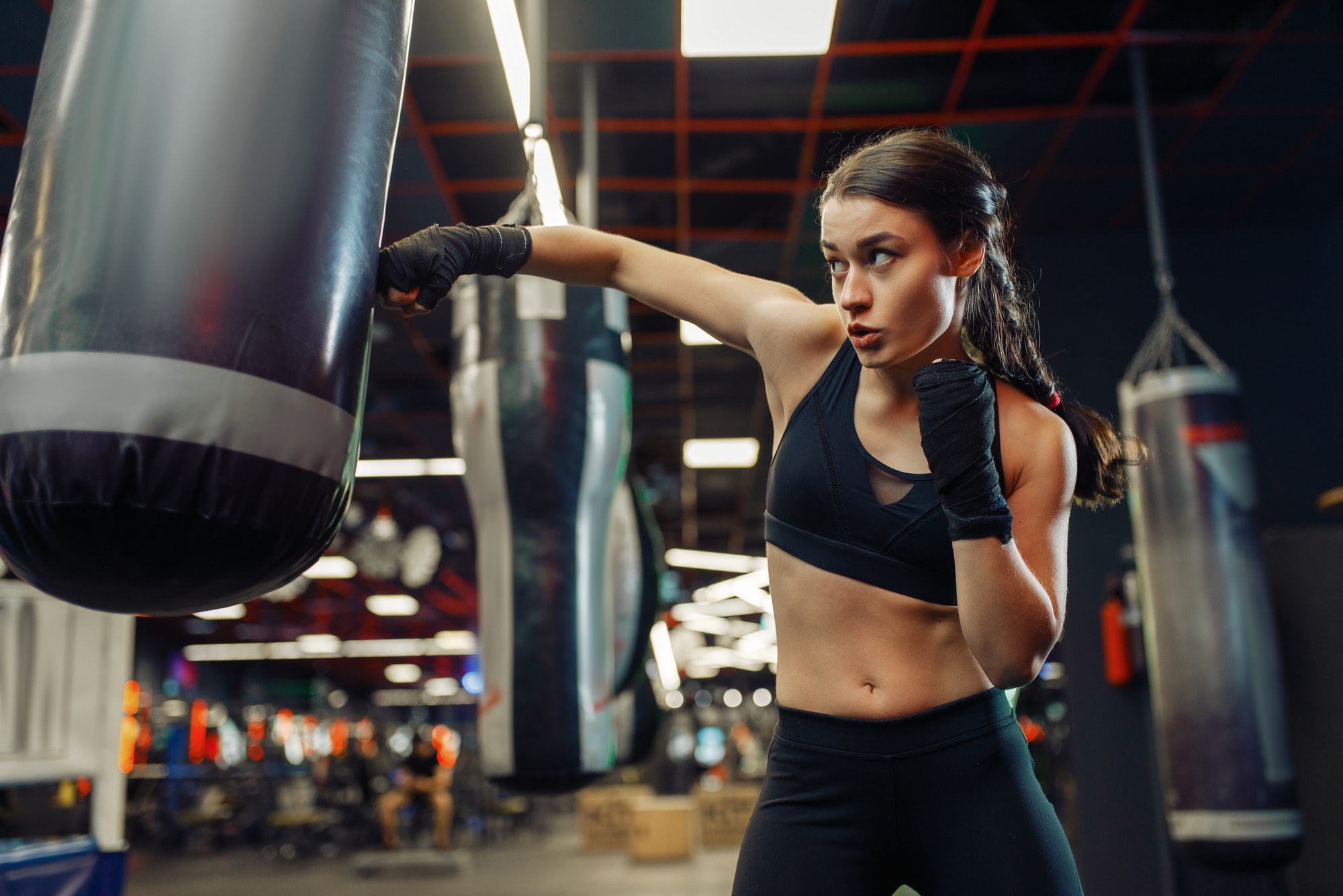 woman-in-boxing-bandages-hits-a-punching-bag-box.jpg